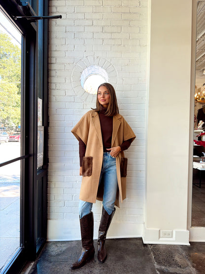 PONCHO WITH FUR POCKETS