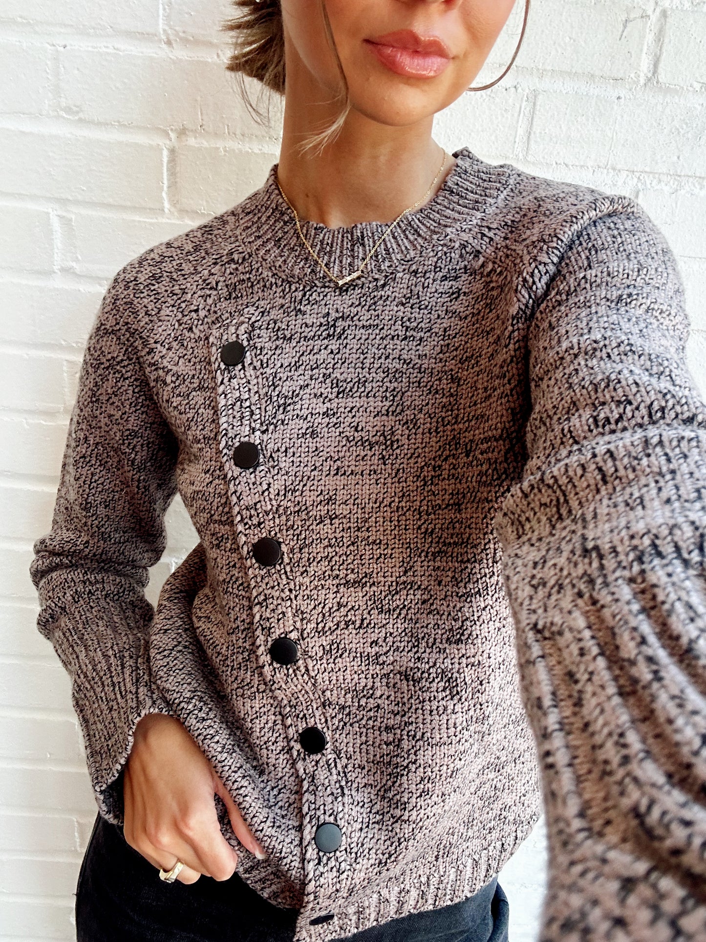 ASYMMETRIC BUTTONED SWEATER