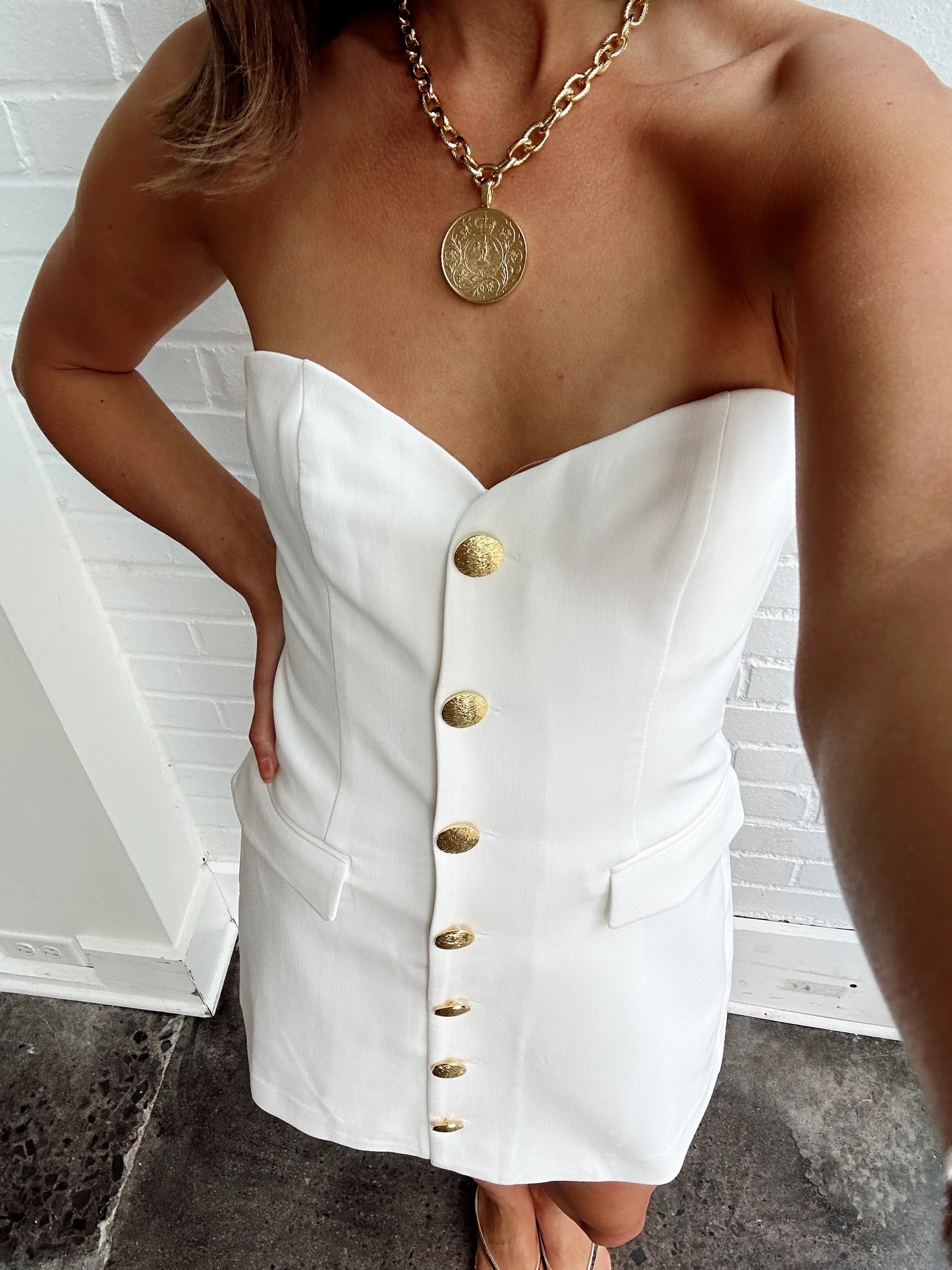 STRAPLESS BUTTONED MINI DRESS