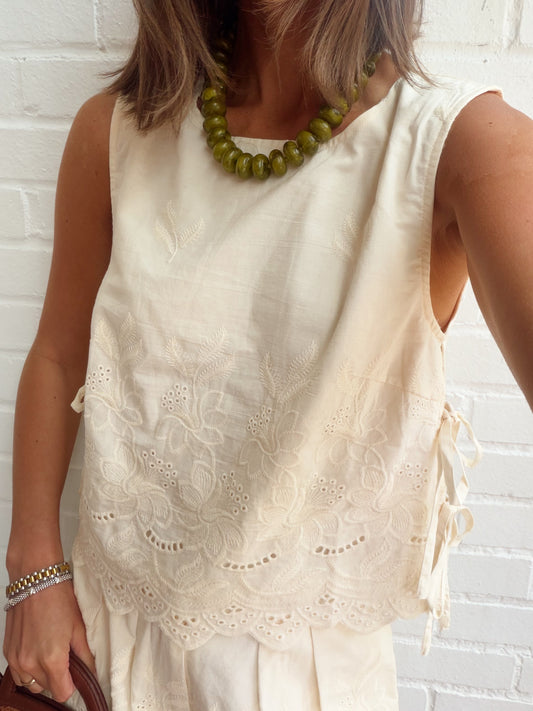 SLEEVLESS LINE EMBROIDERED TOP W/ SIDE TIES