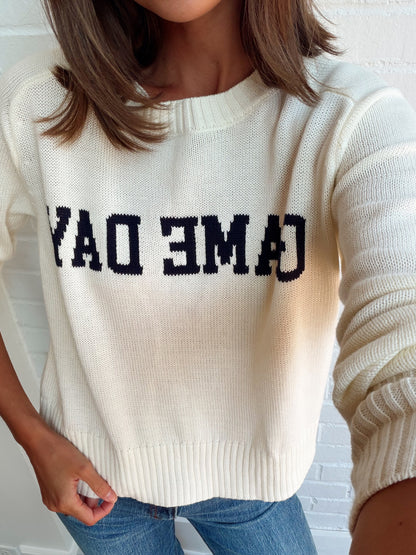 VARSITY STAND IN SWEATER